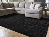 Warmstead Furniture - Ashley Furniture - Gibbswell Rug - Washable 8' x 10' Area Rug / Black - R407461